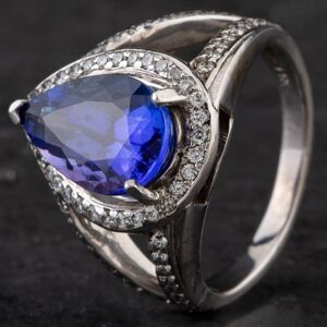 Pre-Owned 14ct White Gold 4.53ct Tanzanite & 0.90ct Brilliant Cut Diamond Spilt Shoulders Dress Ring 4341020 Pre-Owned 14ct White Gold 4.53ct Tanzanite & 0.90ct Brilliant Cut Diamond Spilt Shoulders Dress Ring 4341020