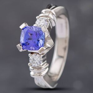 Pre-Owned 18ct White Gold 1.14ct Cushion Cut Tanzanite & 0.20ct Brilliant Cut Diamond Three Stone Ring 43411014 Pre-Owned 18ct White Gold 1.14ct Cushion Cut Tanzanite & 0.20ct Brilliant Cut Diamond Three Stone Ring 43411014