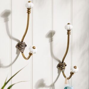 Dibor Set of 2 Cast Iron Tipped Brass Effect Two Section Peg Wall Hooks in Gold Size: Medium Gold M Dibor Set of 2 Cast Iron Tipped Brass Effect Two Section Peg Wall Hooks in Gold Size: Medium Gold M