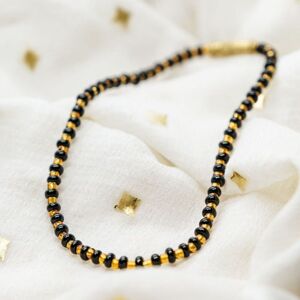 The Colourful Aura Girl's Black Golden Mangalsutra Tiny Black Bead Everyday Kids Nazaria Bracelet Size: 5 inches Black 5 inches The Colourful Aura Girl's Black Golden Mangalsutra Tiny Black Bead Everyday Kids Nazaria Bracelet Size: 5 inches Black 5 inches