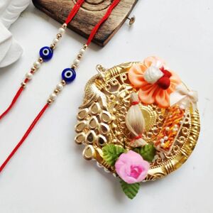 The Colourful Aura 2 Rakhi & 1 Platter of Evil Eye Bead White Pearl Rakhi for Raksha Bandhan White One Size The Colourful Aura 2 Rakhi & 1 Platter of Evil Eye Bead White Pearl Rakhi for Raksha Bandhan White One Size