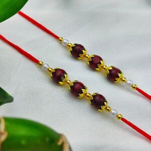 The Colourful Aura Set of 2 of Golden Red Sandalwood Beaded Rakhi for Brother Raksha Bandhan in Brown Brown One Size The Colourful Aura Set of 2 of Golden Red Sandalwood Beaded Rakhi for Brother Raksha Bandhan in Brown Brown One Size