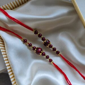 The Colourful Aura Golden Red Sandalwood Beaded Rakhi for Brother Raksha Bandhan Size: 10 inches Red 10 inches The Colourful Aura Golden Red Sandalwood Beaded Rakhi for Brother Raksha Bandhan Size: 10 inches Red 10 inches