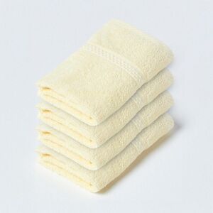Homescapes Pastel Yellow Face Towel 100 % Turkish Cotton, Set of 4 Homescapes Pastel Yellow Face Towel 100 % Turkish Cotton, Set of 4