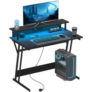 MHSTAR UK LTD HOMCOM Gaming Desk with LED Lights and Power Outlets, 100 x 60cm Z Shaped Computer Desk with Monitor Stand and Steel Frame, PC Gaming Table for Home O