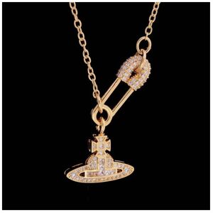 Unbranded Vivienne Westwood Safety Pin Orb Saturn Classic Necklace Gold Tone in box 262 Unbranded Vivienne Westwood Safety Pin Orb Saturn Classic Necklace Gold Tone in box 262