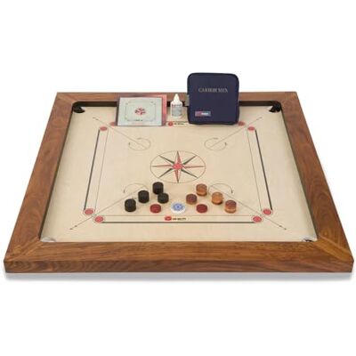 Uber Games Championship Carrom Board Set Official 37" Birch Plywood Game Official size 22kg Carrom board. Features 24mm English Birch plywood surface, 4" Rosewood edges, 24 coins, striker & powder. Uber Games Championship Carrom Board Set Official 37" Birch Plywood Game Official size 22kg Carrom board. Features 24mm English Birch plywood surface, 4" Rosewood edges, 24 coins, striker & powder.