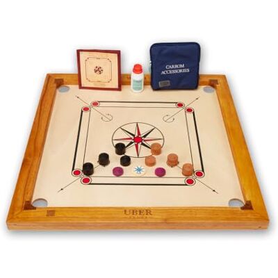 Uber Games Junior Carrom Board Set 27" Size Mango Wood Game Starter set Junior size 6kg Carrom board set. Features 4mm mango ply surface, Kikar wood edges, 24 wooden coins, striker & powder. Uber Games Junior Carrom Board Set 27" Size Mango Wood Game Starter set Junior size 6kg Carrom board set. Features 4mm mango ply surface, Kikar wood edges, 24 wooden coins, striker & powder.