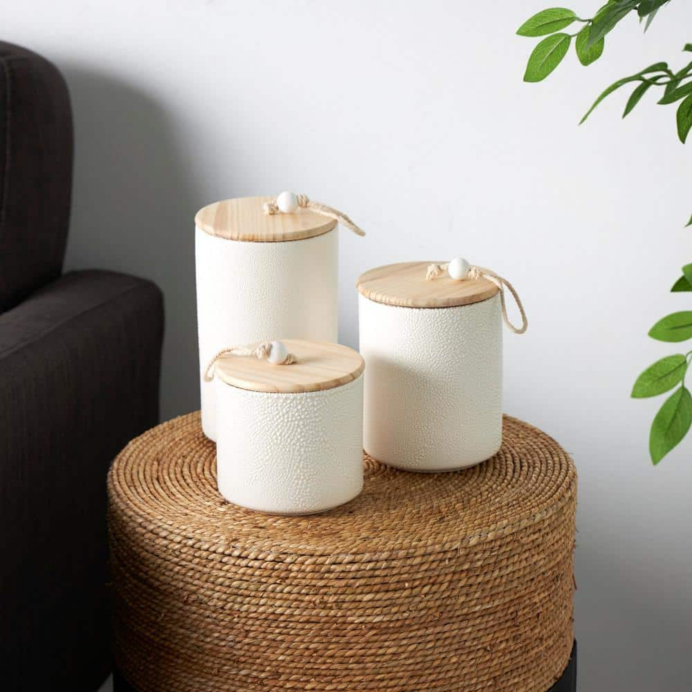 Litton Lane Cream Spotted Textured Decorative Canisters with Brown Wood Lids and Beaded Accents (Set of 3)