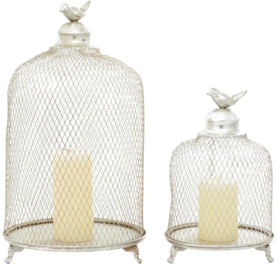 Litton Lane Silver Metal Cage Style Cloche Decorative Bird Candle Lantern with Elevated Stand (Set of 2)