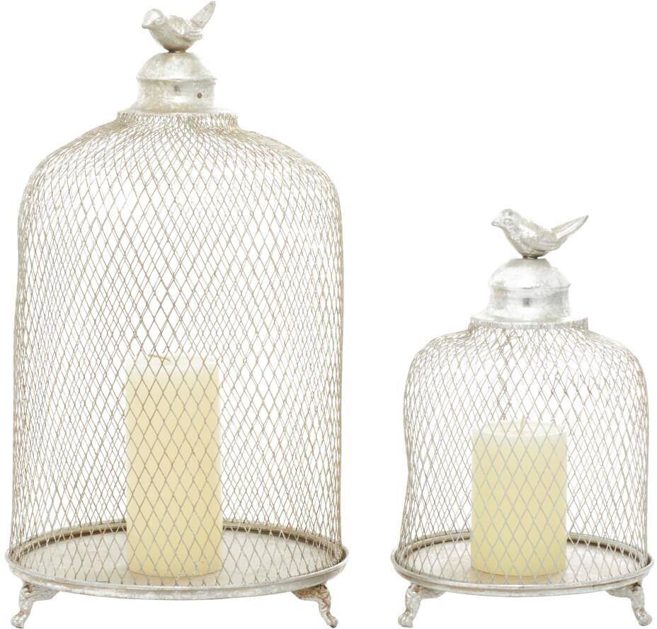 Litton Lane Silver Metal Cage Style Cloche Decorative Bird Candle Lantern with Elevated Stand (Set of 2)