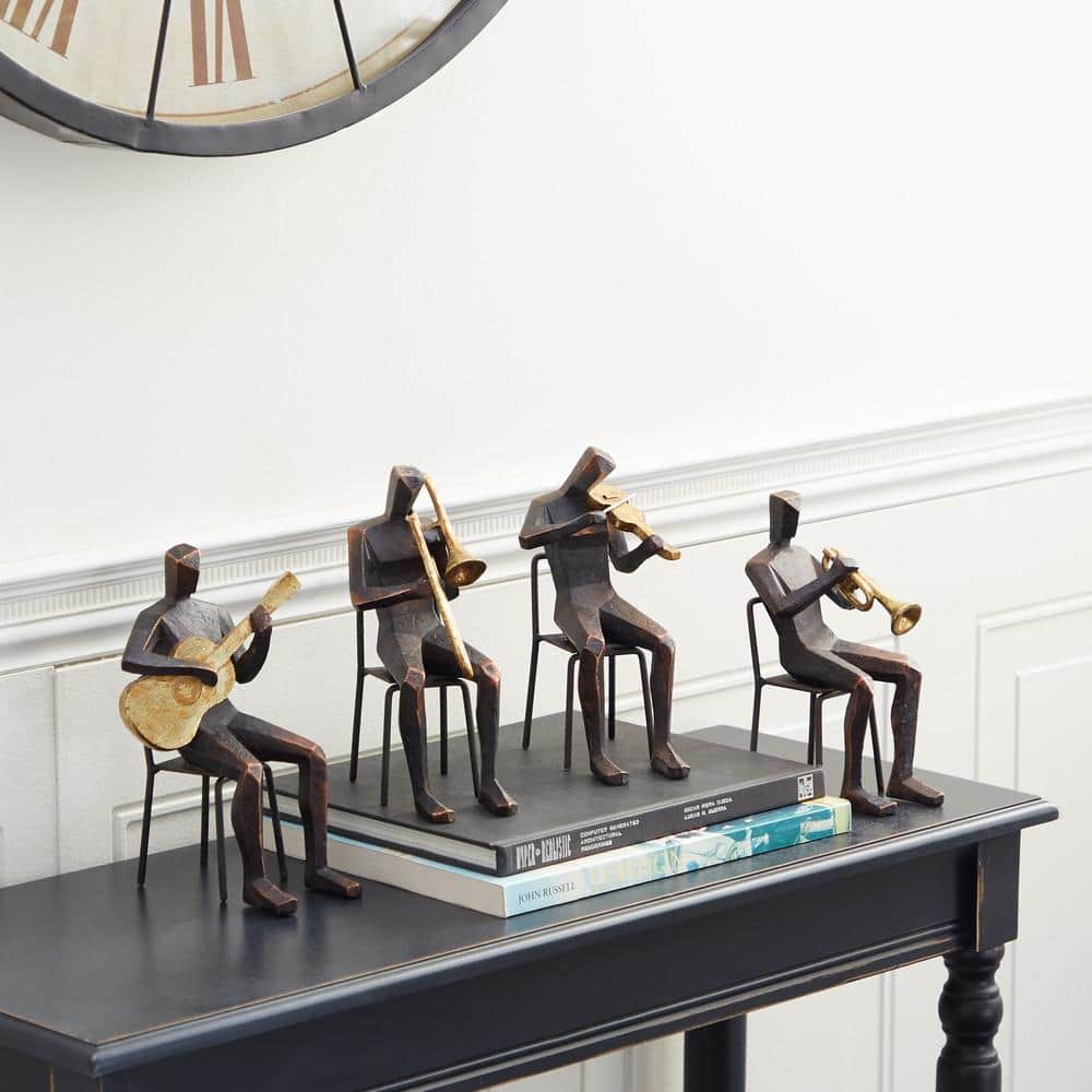 Litton Lane Brown Polystone Musician Sculpture with Gold Instruments (Set of 4)