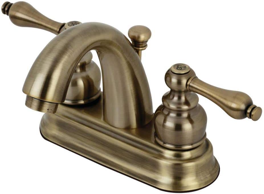 Kingston Restoration 4 in. Centerset 2-Handle Bathroom Faucet in Antique Brass