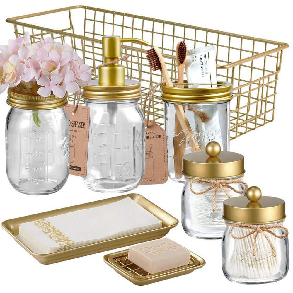 Dracelo 8-Piece Bathroom Accessory Set with Lotion Dispenser, Toothbrush Holder, Apothecary Jars, Soap Dish, Vanity Tray in Gold