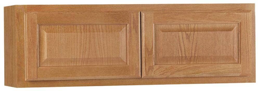 Hampton Bay Hampton 36 in. W x 12 in. D x 12 in. H Assembled Wall Bridge Kitchen Cabinet in Medium Oak without Shelf