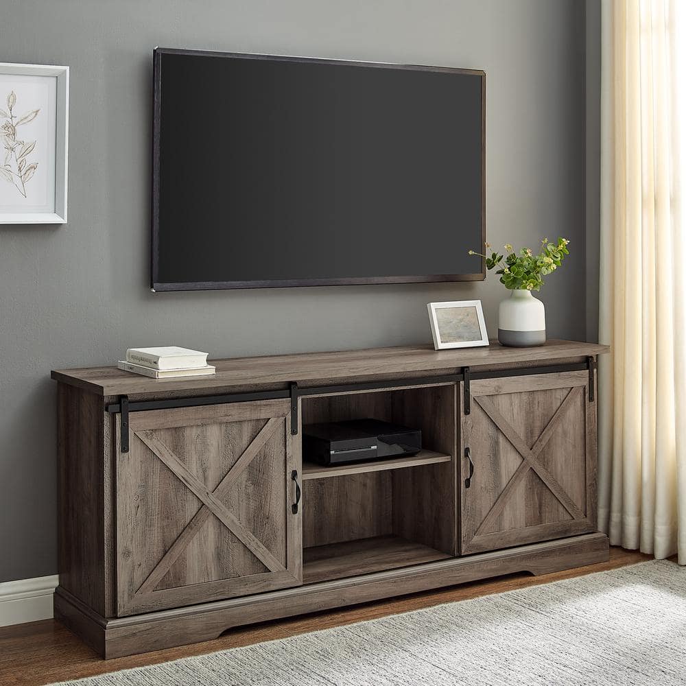 Welwick Designs 70 in. Grey Wash Wood and Metal TV Stand with Sliding X Barn Doors (Max tv size 80 in.)