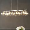 JONATHAN Y Julian 33.5 in. 8-Light Nickel/Clear Farmhouse Bohemian Iron/Glass Linear LED Pendant