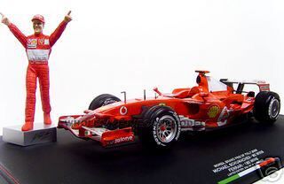 Ferrari #5 Michael Schumacher Winner F1 Formula One Monza Italian GP (2006) with Michael Schumacher Figurine 1/18 Diecast Model Car by Hot Wheels