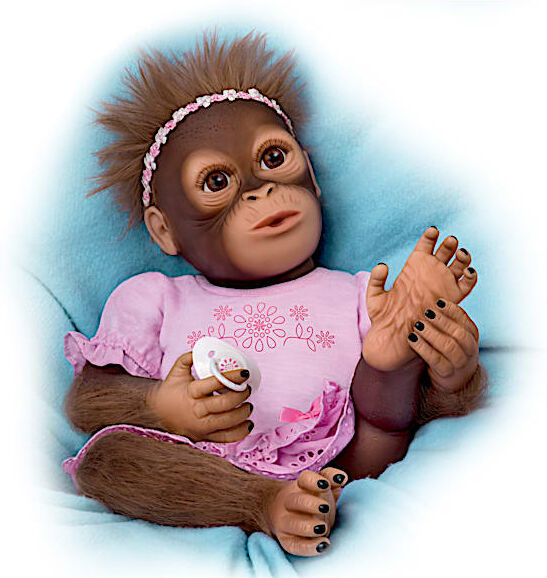 The Ashton-Drake Galleries Cooing Cora Baby Monkey Doll Coos and Breathes