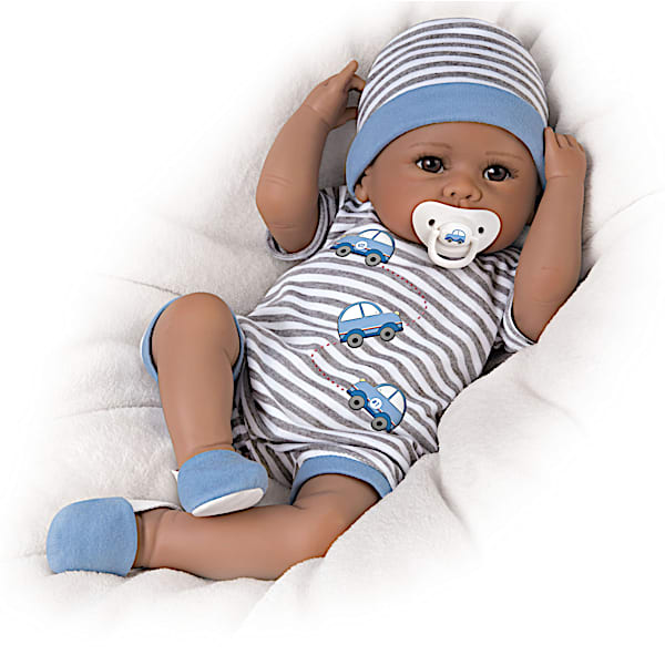 The Ashton-Drake Galleries Touch-Activated Baby Doll Coos And Has A Heartbeat