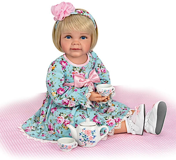 The Ashton-Drake Galleries Toddler Doll With Porcelain Tea Set Is Perfect For Posing