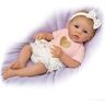 The Ashton-Drake Galleries Cooing Baby Girl Doll With Heartbeat By Linda Murray