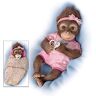 The Ashton-Drake Galleries Snuggle Suri Lifelike Baby Monkey Doll With Custom Bunting