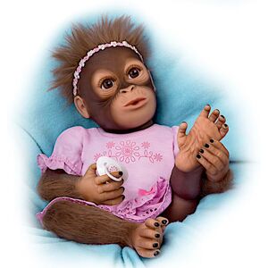 The Ashton-Drake Galleries Cooing Cora Baby Monkey Doll Coos and Breathes
