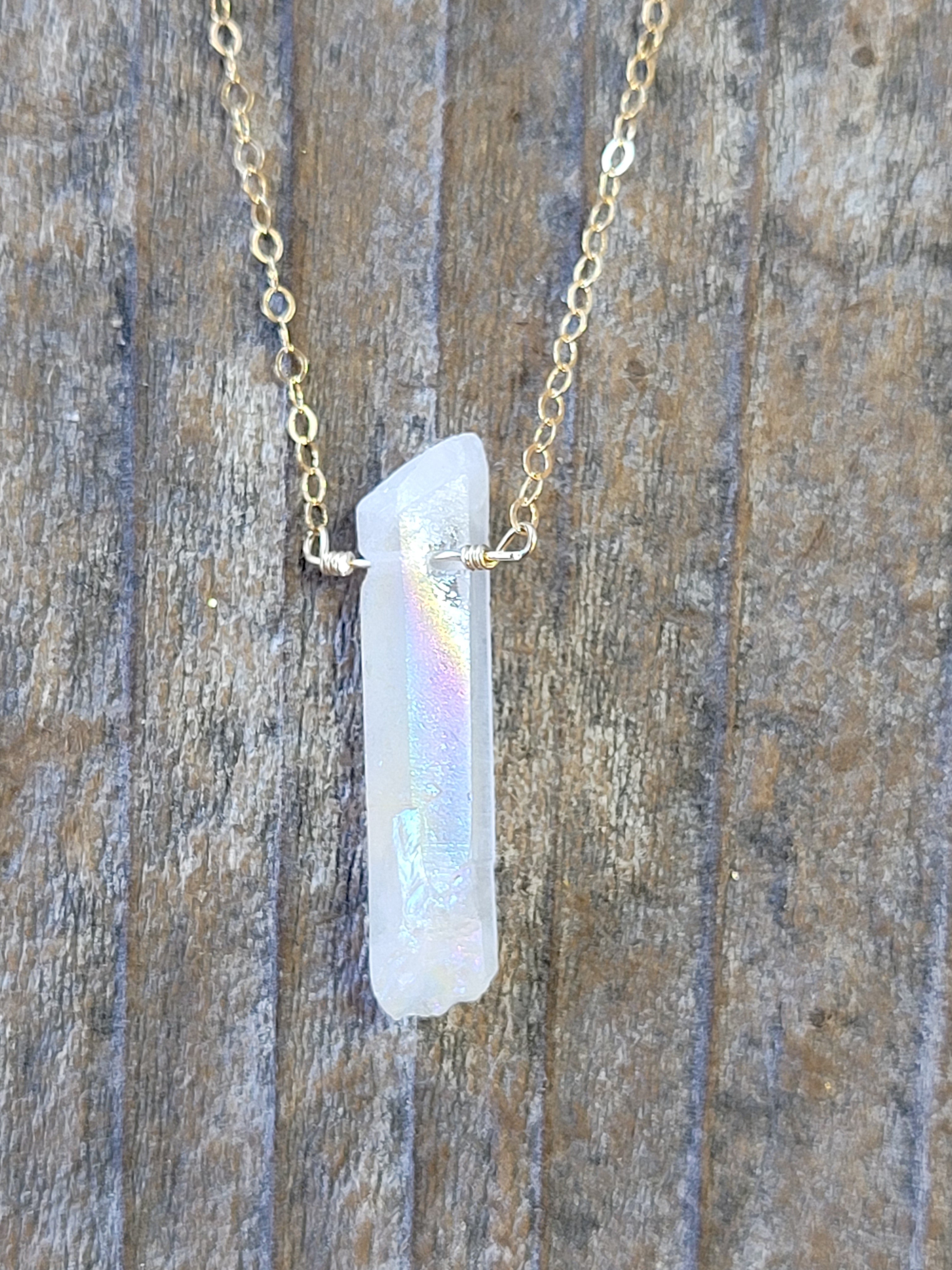 A Blonde and Her Bag Single Raw Rainbow Quartz Crystal Pendant Necklace in Gold female