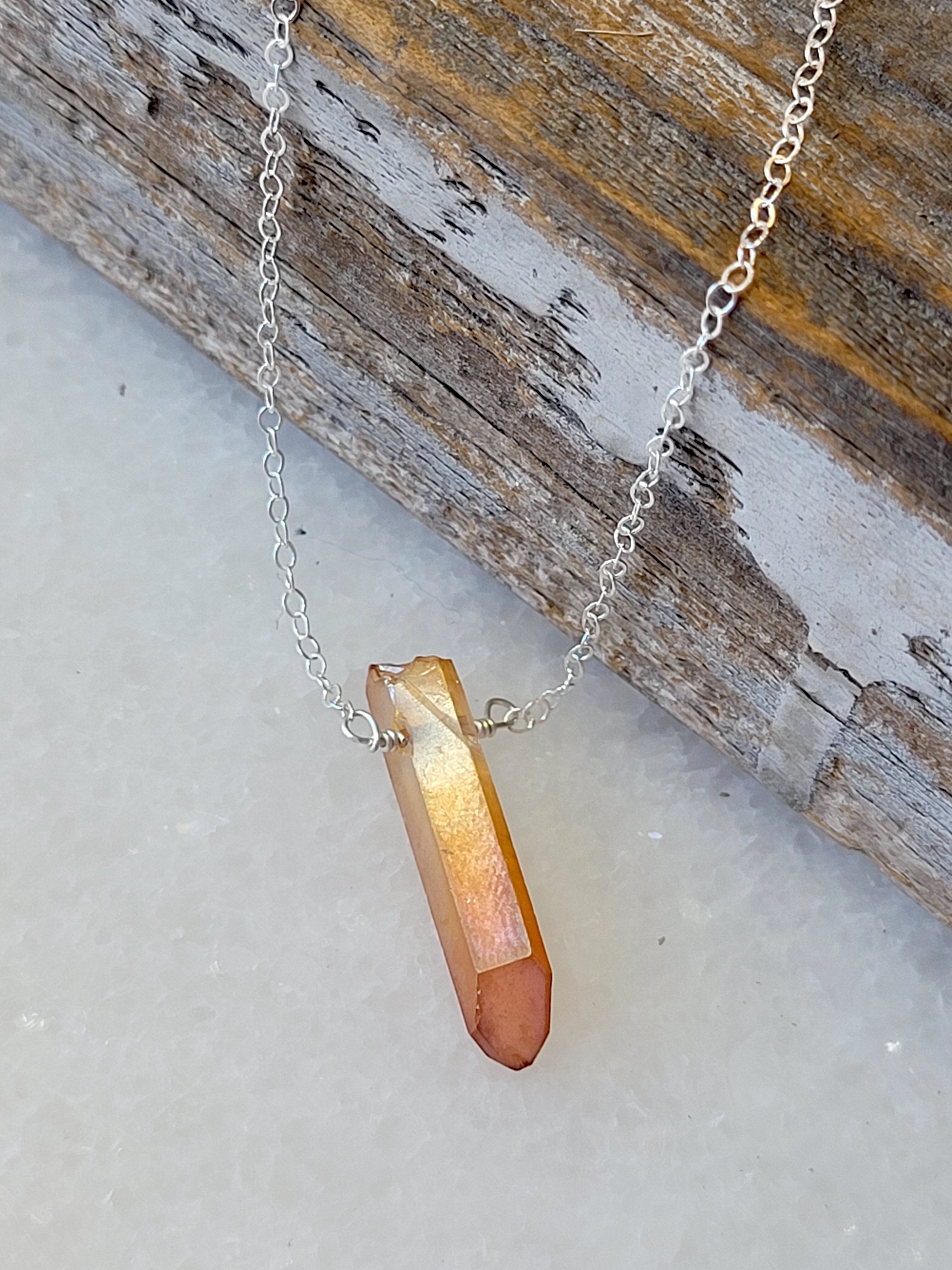 A Blonde and Her Bag Single Raw Peach Quartz Crystal Pendant Necklace in Silver female