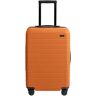 Away The Bigger Carry-On in Sorbet Orange