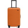 Away The Bigger Carry-On Flex in Sorbet Orange