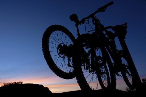 Art.com Photographic Print: A Silhouette of Two Mountain Bikes on Car Rack in Red Rock Canyon in Nevada by Brett Holman: 24x16in