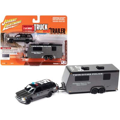 1997 Chevrolet Tahoe "SWAT" Custom Gray Metallic and Black w/Camper Trailer 1/64 Diecast Model Car by Johnny Lightning 1997 Chevrolet Tahoe "SWAT" Custom Gray Metallic and Black w/Camper Trailer 1/64 Diecast Model Car by Johnny Lightning