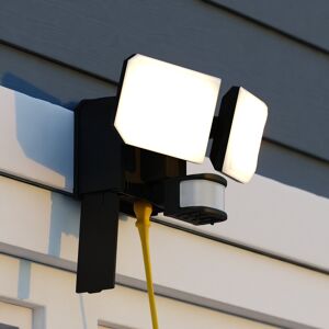 VAXCEL 2-Head Black Motion Sensor Dusk to Dawn Outdoor Security Flood Light with GFCI Outlet , Adjustable LED Heads Black 10.5-in W x 6.75-in H x 6.5-in D VAXCEL 2-Head Black Motion Sensor Dusk to Dawn Outdoor Security Flood Light with GFCI Outlet , Adjustable LED Heads Black 10.5-in W x 6.75-in H x 6.5-in D