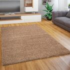 Paco Home Beigefarbener Hochflor-Teppich - Teppiche