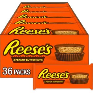 Reese's Tasses au chocolat au lait et beurre de cacahuète - Bonbons - Publicité Reese's Tasses au chocolat au lait et beurre de cacahuète - Bonbons - Publicité