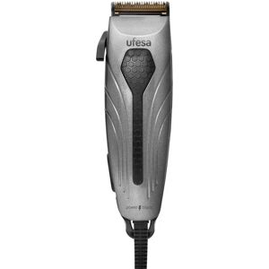 Ufesa CP6105 Cortapelos - Cuchillas ajustables - Titanio y acero inoxidable Ufesa CP6105 Cortapelos - Cuchillas ajustables - Titanio y acero inoxidable