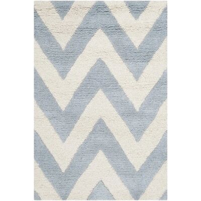 Tapis Stella Bleu Safavieh - Laine, Rectangulaire, 180x120 cm - Publicité Tapis Stella Bleu Safavieh - Laine, Rectangulaire, 180x120 cm - Publicité