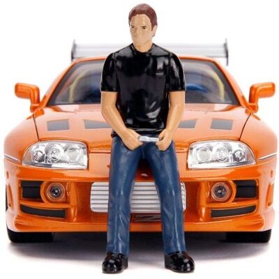 Jada Toys Fast & Furious Toyota Supra 1:18 Pomarańczowy z figurką Briana i światłami Jada Toys Fast & Furious Toyota Supra 1:18 Pomarańczowy z figurką Briana i światłami