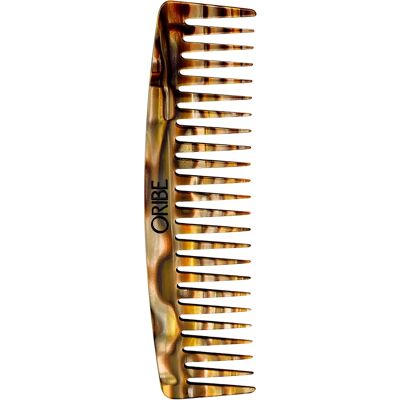 Oribe Modèle Peigne à Dents Larges - Outil de Coiffure - Publicité Oribe Modèle Peigne à Dents Larges - Outil de Coiffure - Publicité