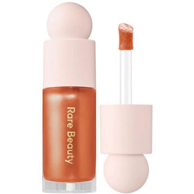 Rare Beauty - Lumière Positive - Highlight Liquide - Pour Femmes - Publicité Rare Beauty - Lumière Positive - Highlight Liquide - Pour Femmes - Publicité