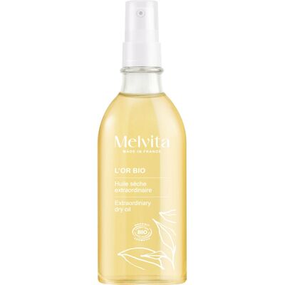 Huile Bio L'Or Bio 100ml Melvita pour visage, corps et cheveux - Publicité Huile Bio L'Or Bio 100ml Melvita pour visage, corps et cheveux - Publicité