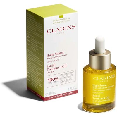 Huile de traitement pour le visage Santal Clarins - Peau sèche - Publicité Huile de traitement pour le visage Santal Clarins - Peau sèche - Publicité