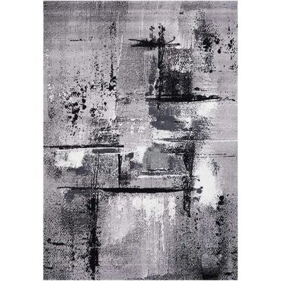 Tapis rectangulaire gris en polypropylène de UNAMOURDETAPIS - Style moderne - Publicité Tapis rectangulaire gris en polypropylène de UNAMOURDETAPIS - Style moderne - Publicité