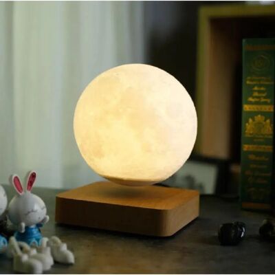 Lampe LED en lévitation Moonflight de Magneticland - Socle en Bois Clair - Type de Produit - Publicité Lampe LED en lévitation Moonflight de Magneticland - Socle en Bois Clair - Type de Produit - Publicité