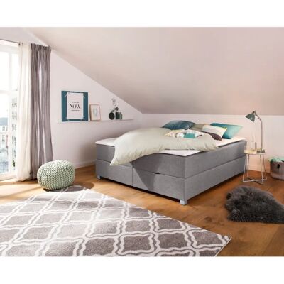 INOSIGN Alexis - Hellgraues Boxspringbett mit Stauraum - Bett INOSIGN Alexis - Hellgraues Boxspringbett mit Stauraum - Bett