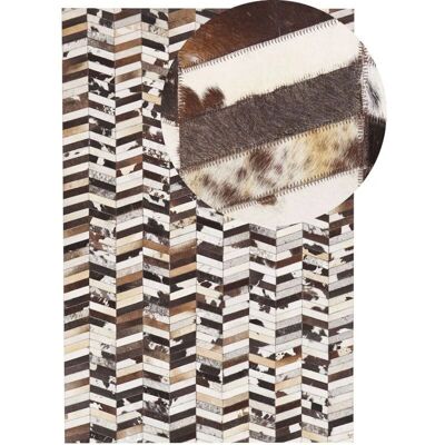 Tapis Patchwork Beliani - Cuir de Vache Marron et Blanc - 140x200cm - Publicité Tapis Patchwork Beliani - Cuir de Vache Marron et Blanc - 140x200cm - Publicité