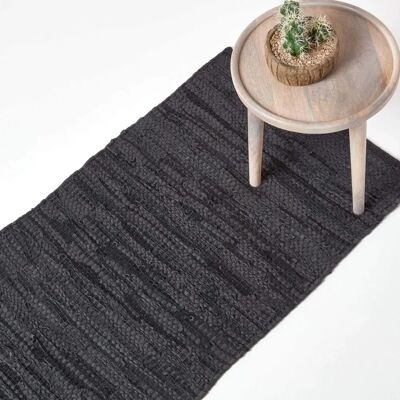 Tapis tissé en cuir Denver Homescapes - Fait main, Noir, 66x200 cm - Publicité Tapis tissé en cuir Denver Homescapes - Fait main, Noir, 66x200 cm - Publicité