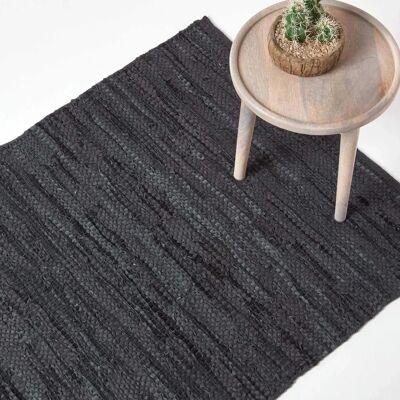 Homescapes Denver Leather Woven Rug - Recycled Leather, 150x240cm, Black Homescapes Denver Leather Woven Rug - Recycled Leather, 150x240cm, Black